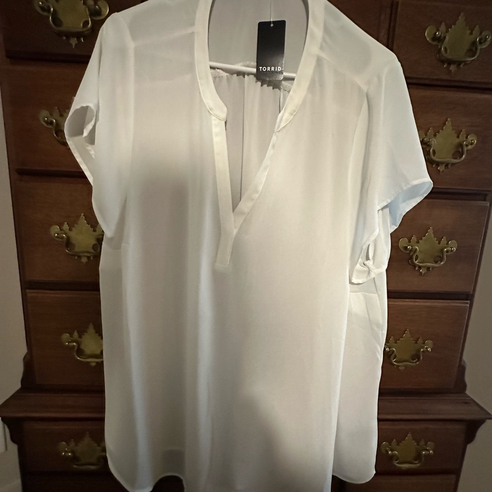 White,dressy work shirt.